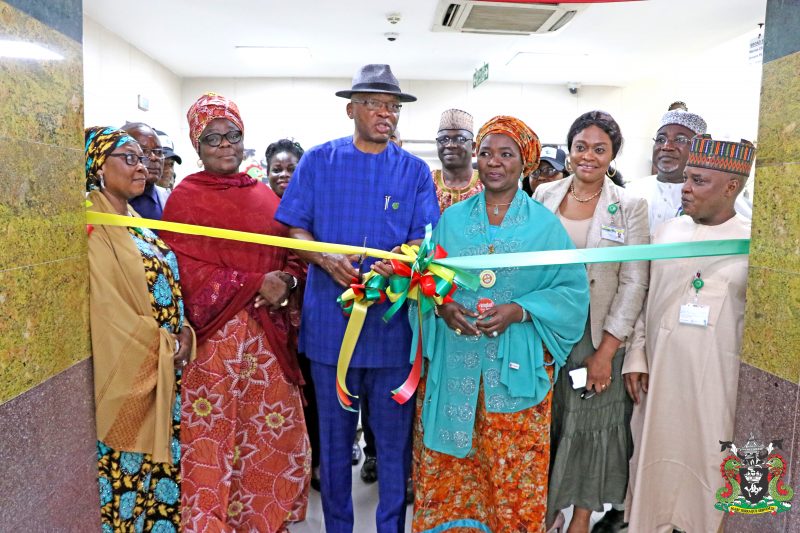 The Representative of the Managing Director, Nigerian Ports Authority (NPA), the Executive Director, Marine & Operations, Dr. Sokonte Davies unveils the commemorative banner during the occasion. (PHOTOS – NPA MEDIA)